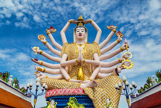 sculpture of a many-armed Hindu deity.